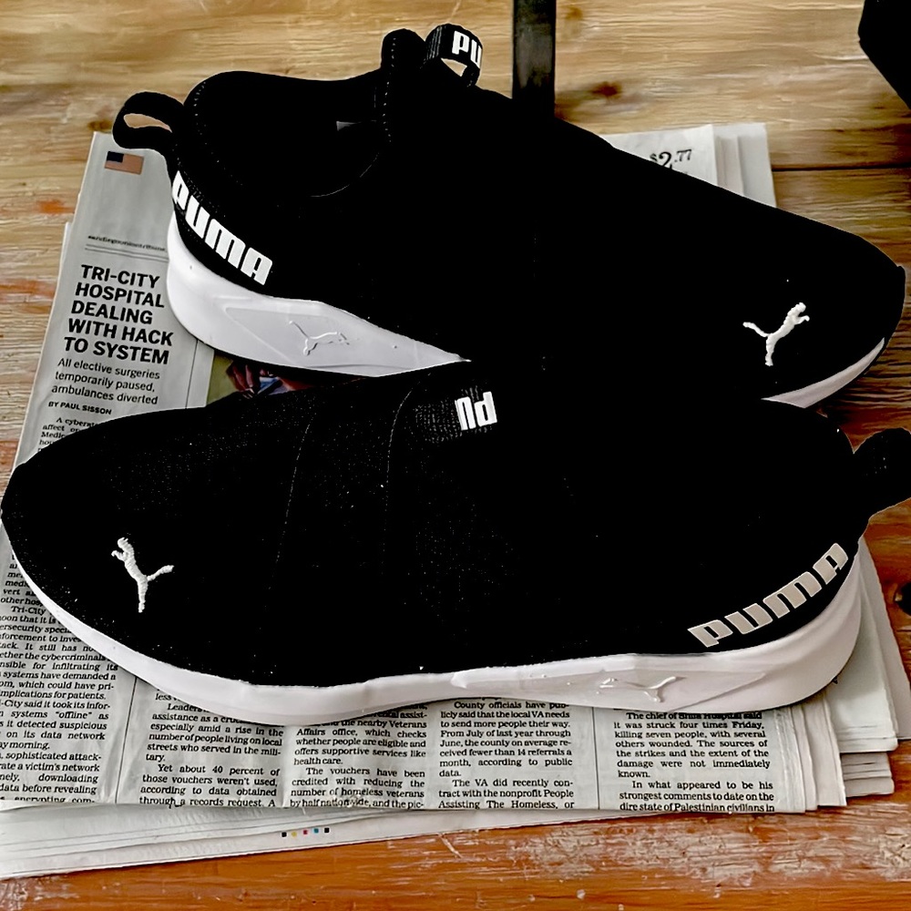 Puma athletic shoes. Black and white soles. Almost new, wore once.